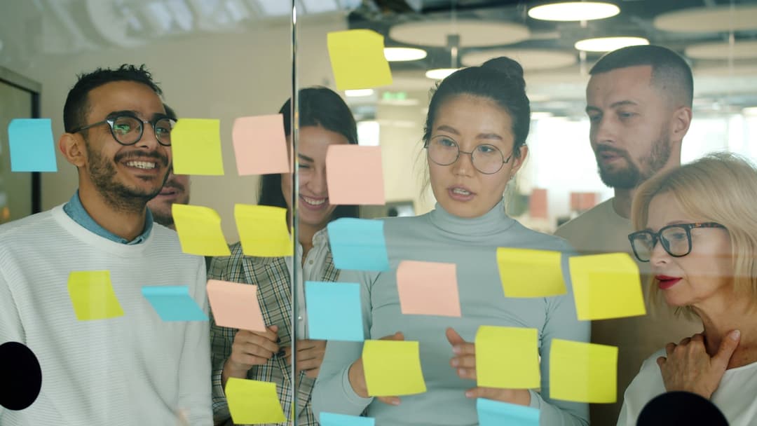 Team with sticky notes